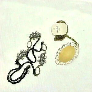 Bundle of two necklaces long dangly gem black yellow gold silver statement piece